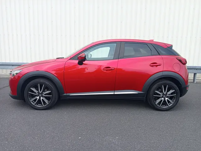 Czerwona Mazda CX-3, sprzedany, widok z boku